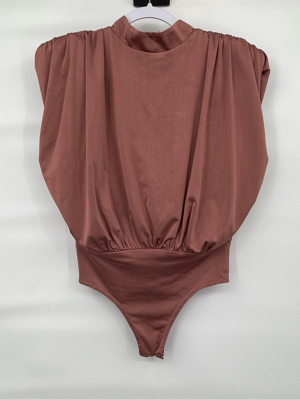 glam satin dusty rose open back shoulder padded bodysuit